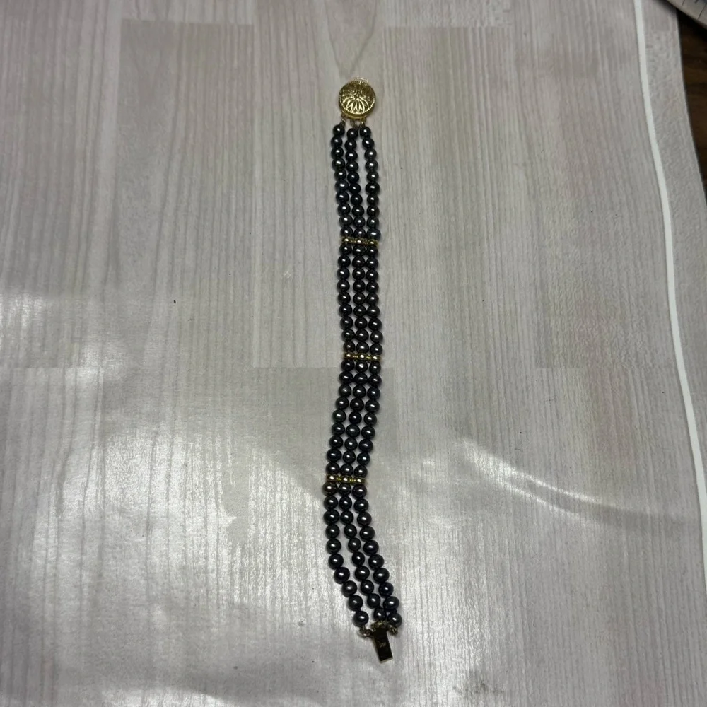 14k Yellow Gold Elegant Black Natural Multi-Strand Pearl Bracelet.
